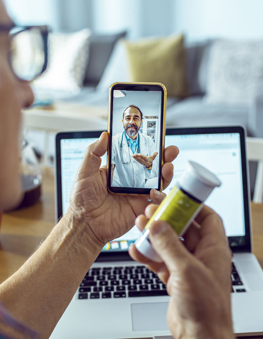 patient-showing-doctor-medication-during-telehealth-visit (1)